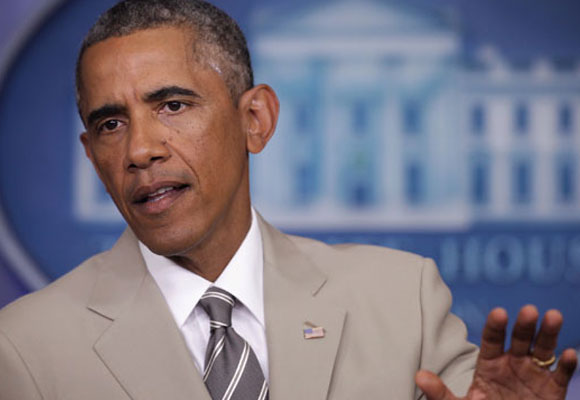 Barack Obama con traje beige