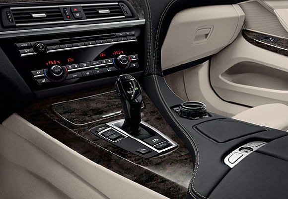 BMW 650i Gran Coupe interior cabin featuring Ivory White-Black Nappa leather and Dark Grey Poplar wood trim