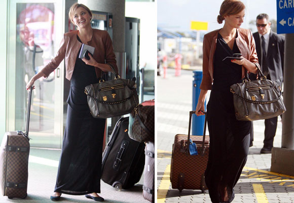 Miranda Ker with Louis Vuitton suitcases. Make clic to buy